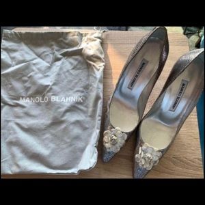 Never worn, brand new Manolo Blahnik pumps with dust bag.